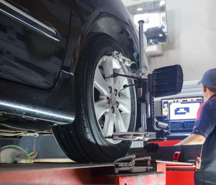 Direction and Wheel alignment at Fairview AutoPro in Burlington - mechanic who checks a car with the appropriate software